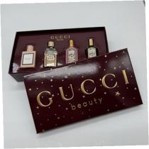 Gucci Mini Set    Edp Bloom 5 ml + Edp Flora Gorgeous Gardenia 5 ml + Edp Flora Gorgeous Gardenia Intense 5 ml + Edt Guilty Pour Femme 5 ml Eau de Toilette  5ml(Eau de Parfum) Per Donna